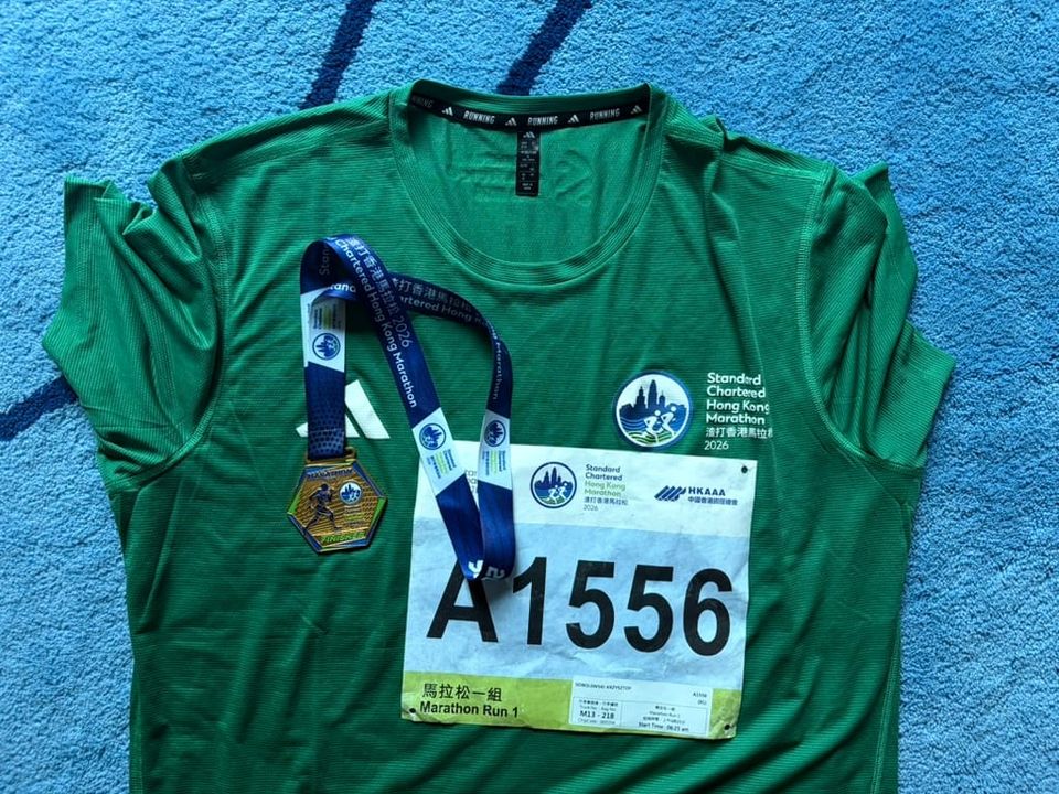 Run t-shirt, bib, and medal