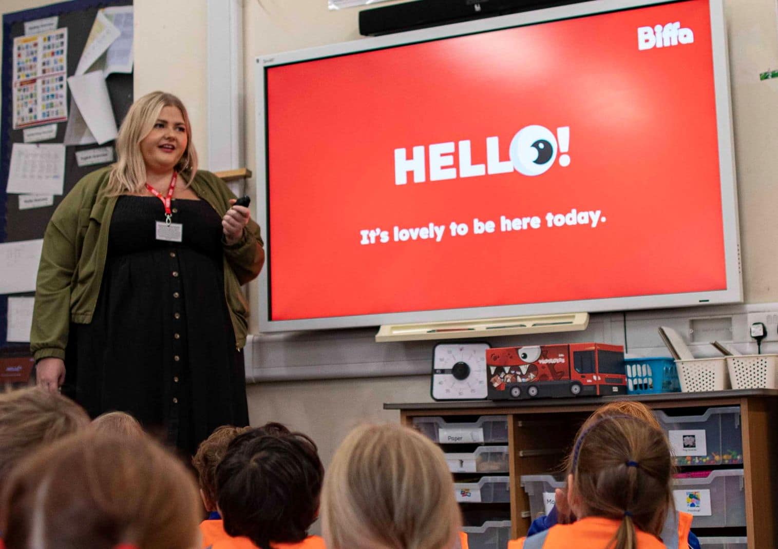 Georgia Gibson of Biffa speaking in front of a primary school