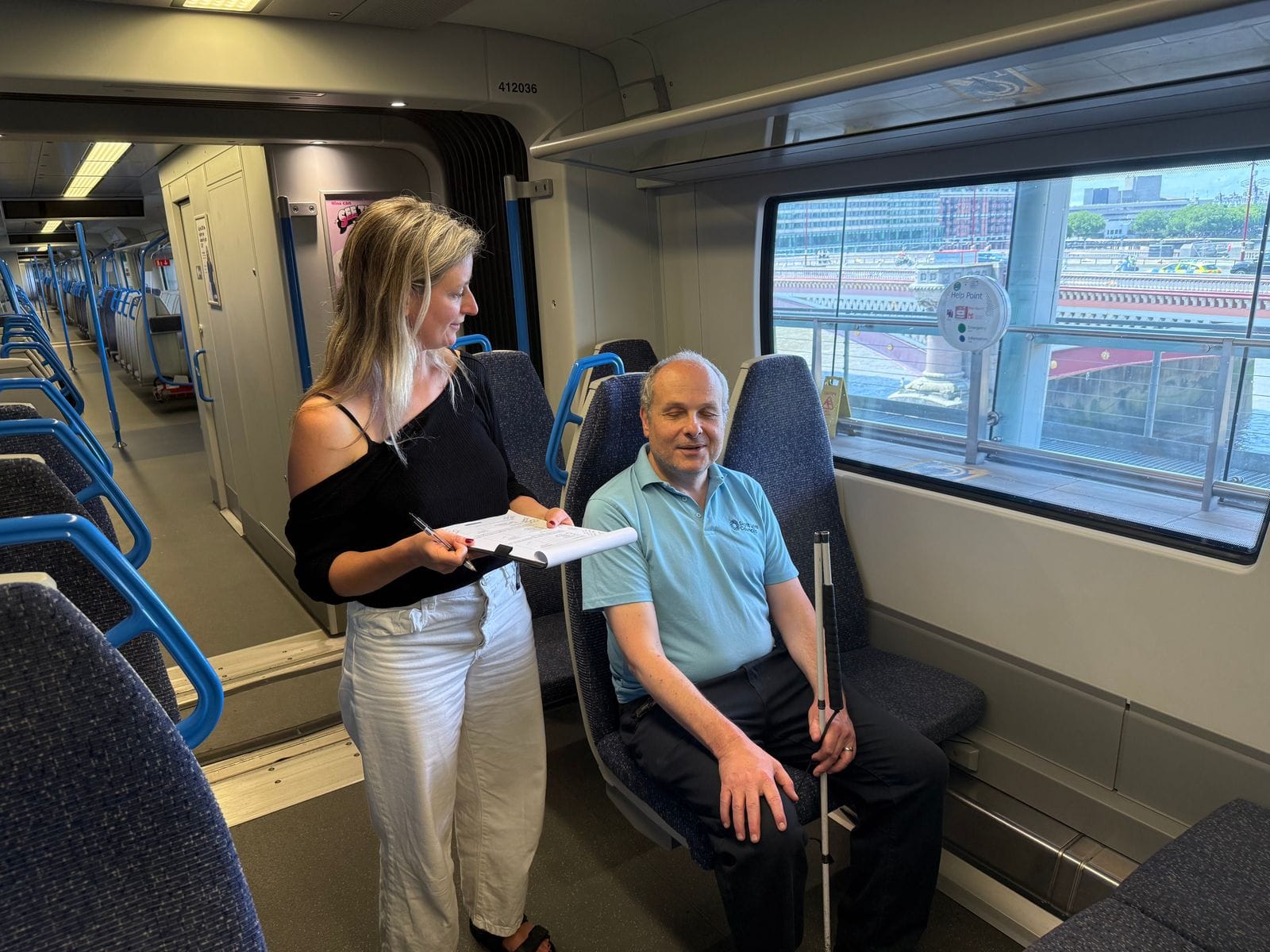 Passenger sitting in the new Thameslink seat during a trial at Blackfriars