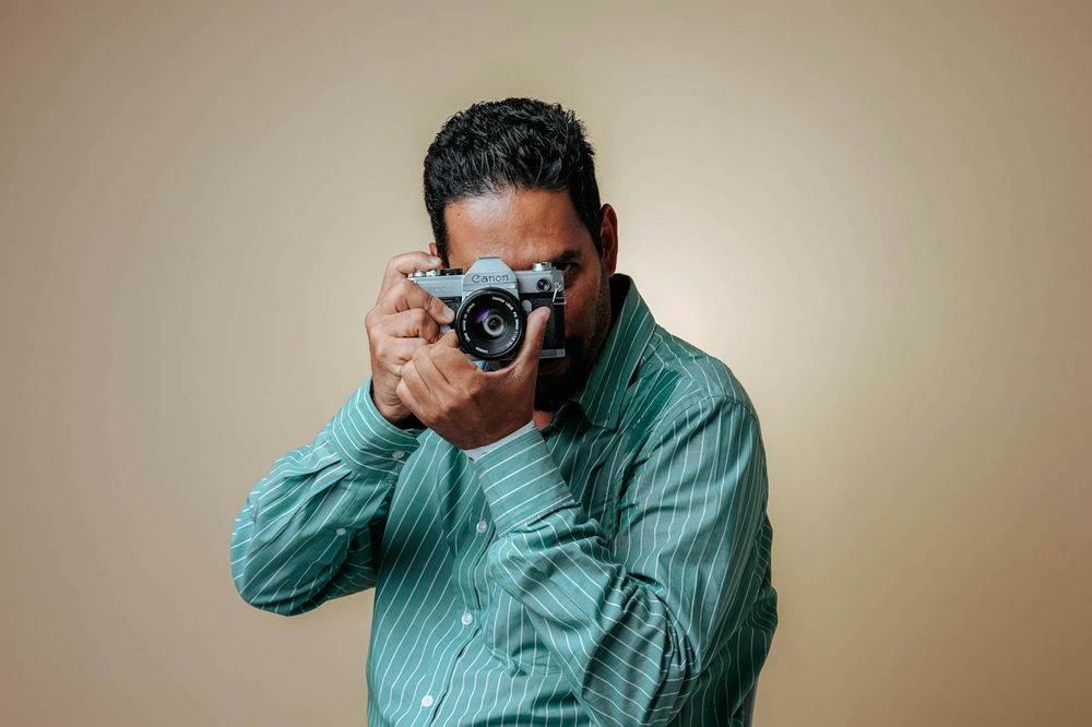 photographer camera professional equipment