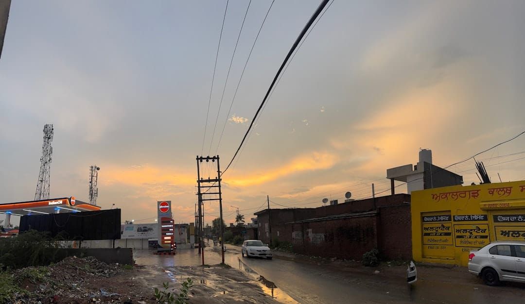 Street scene with overcast sky at sunset