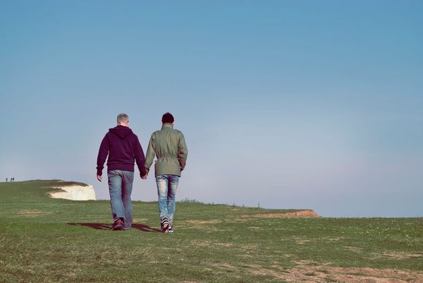 Retired couple walking in a UK park