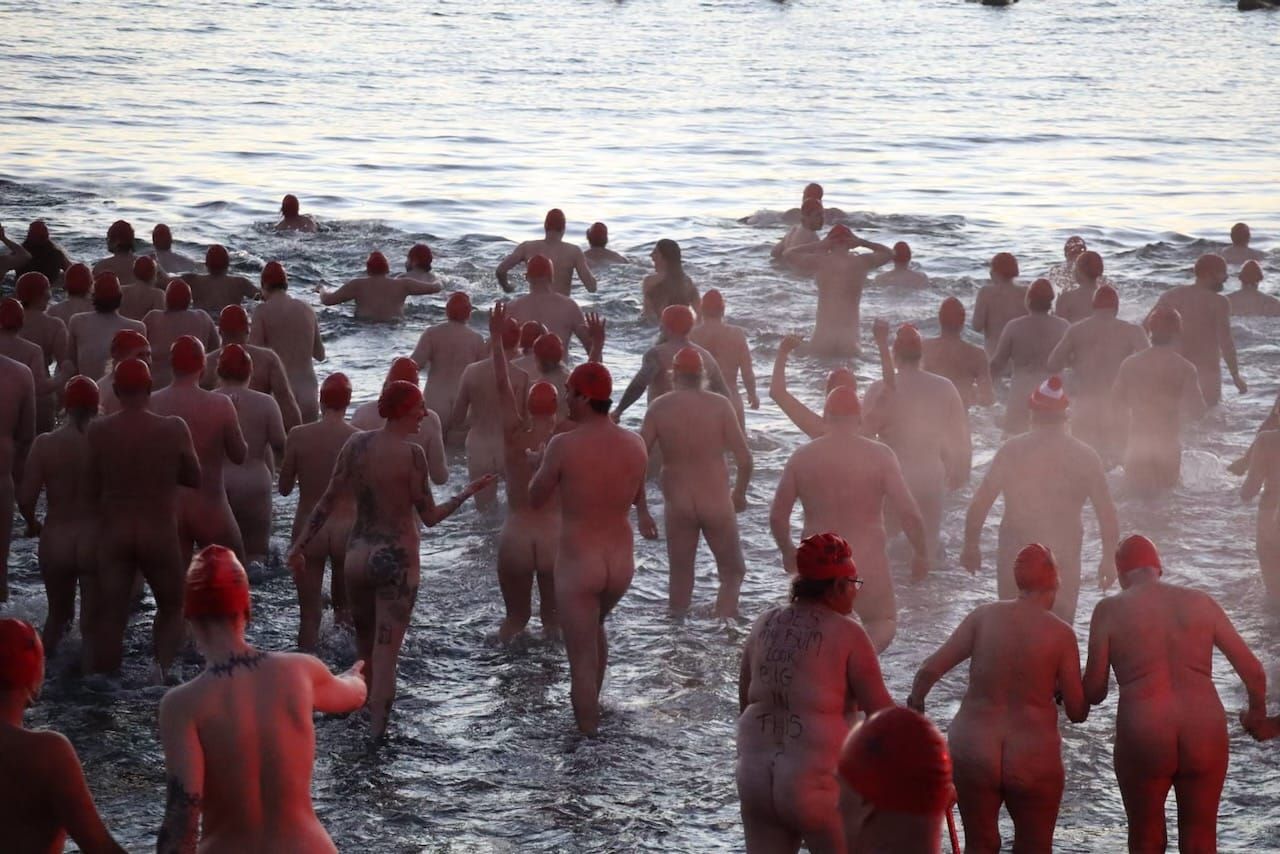 Cold, Naked, and Completely Alive: 3,000 People Welcome Winter the Hard Way