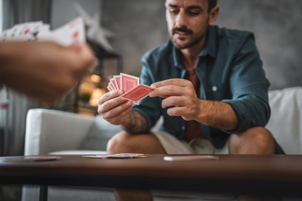 What are the rules of Strip Poker?