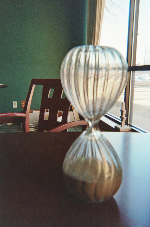 hour glass on a table