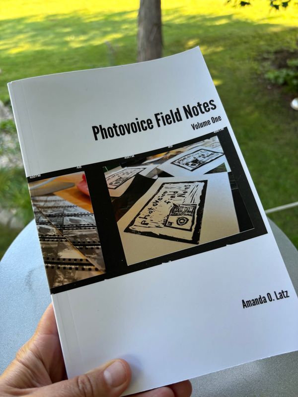 front cover of the book Photovoice Field Notes: Volume One by Amanda O. Latz against a natural background
