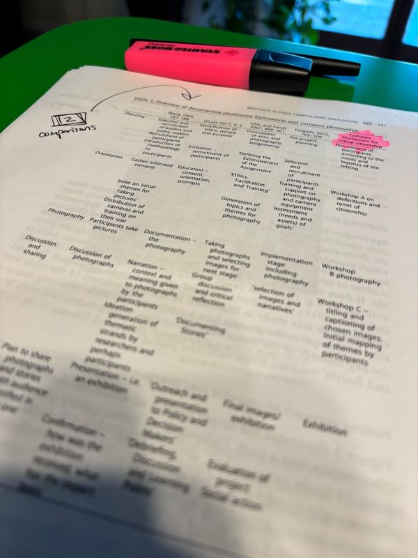 page 731 of the article featured in this post atop a green standing desk with a pen and highlighter also on the desk