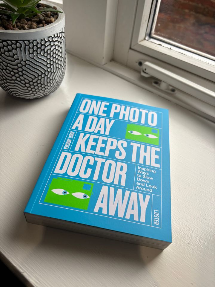 a book on a window sill