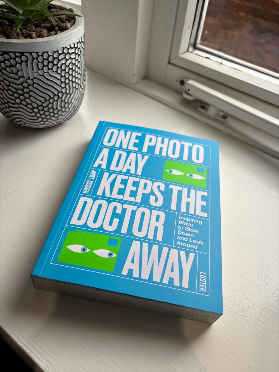 a book on a window sill