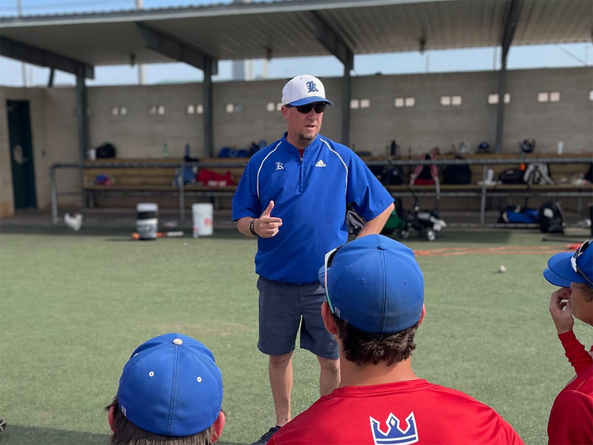 Coach Jim Cason speaks to Tomball Kings players after high school practice on May 14, 2025.