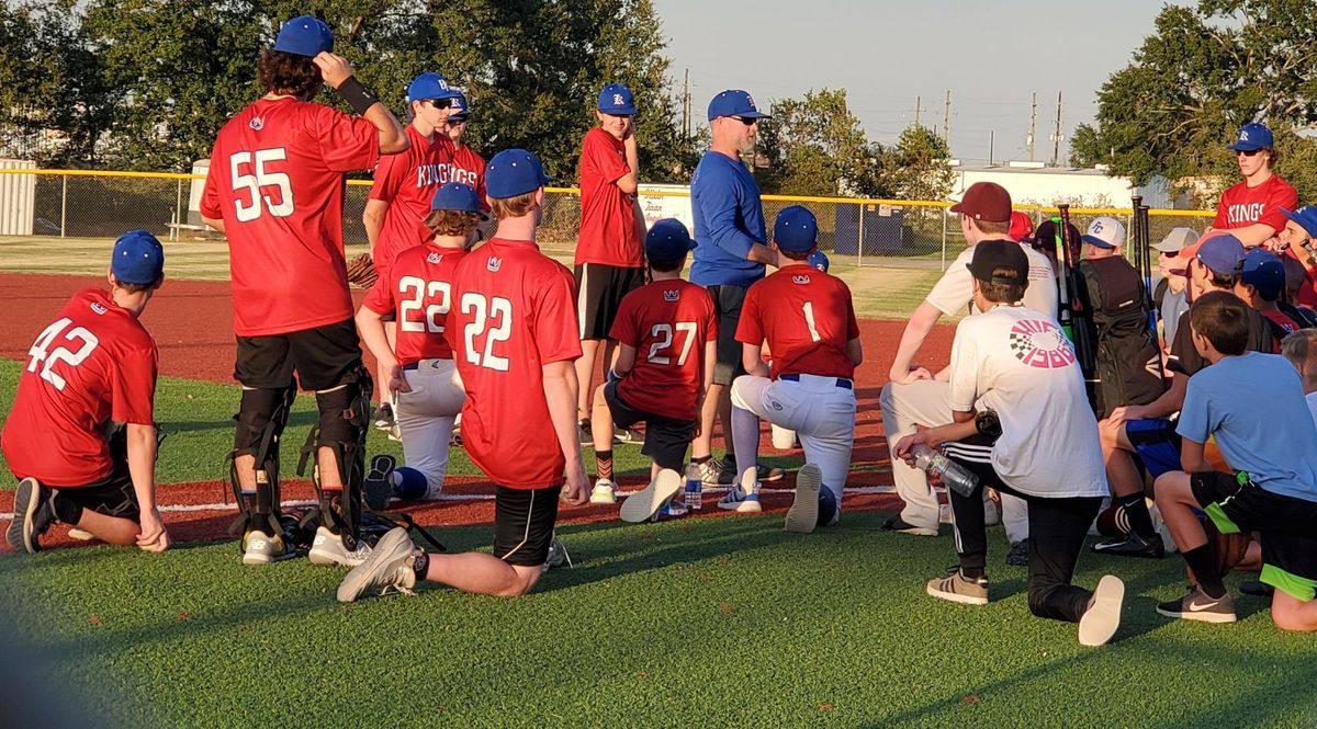 Tomball Kings head coach Philip Wilkins speaks to players before tryouts.