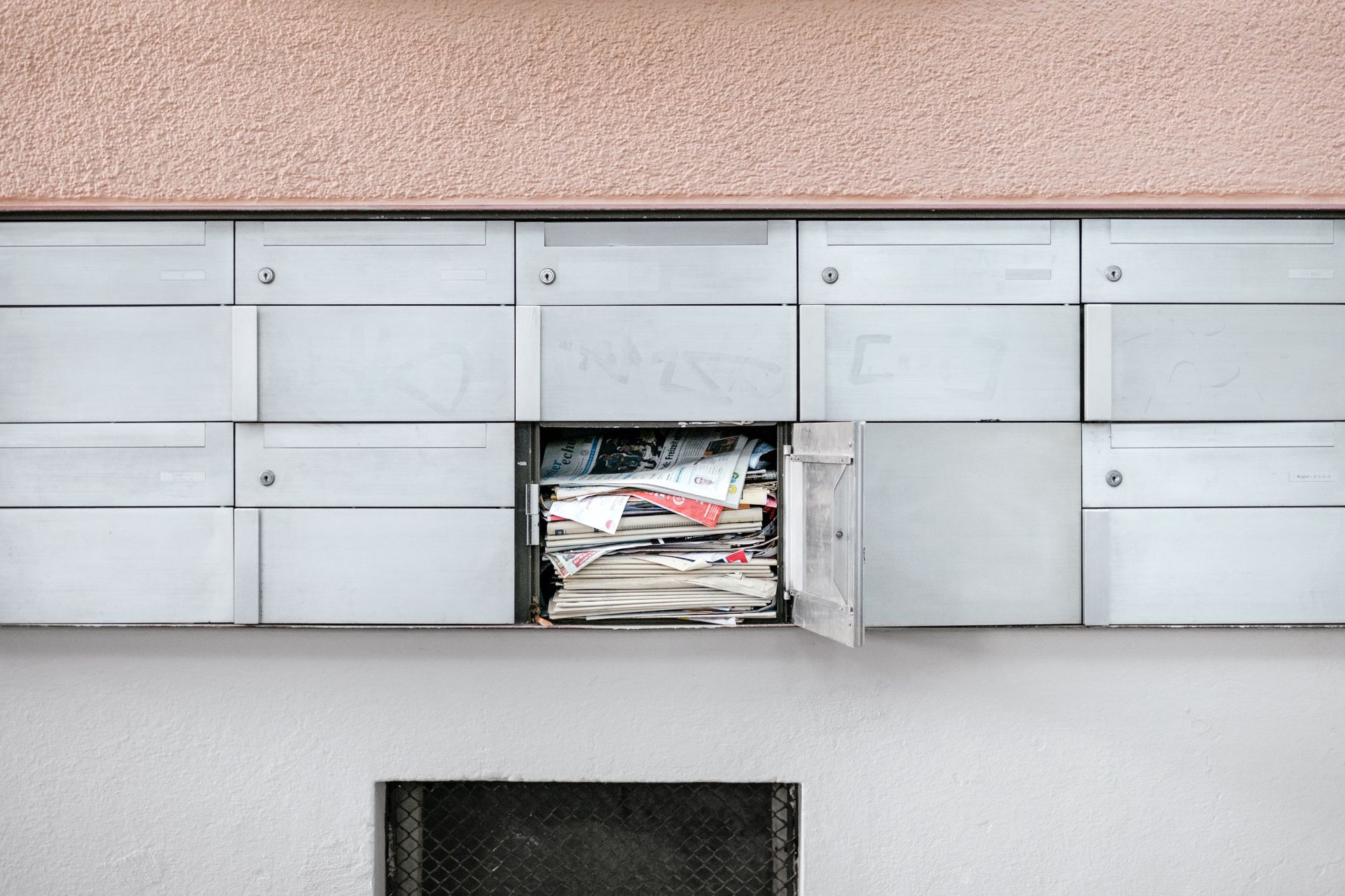 Mailbox with stacks of paper