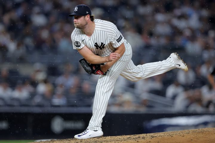 Yankees starting pitcher Gerrit Cole (45) follows through on a pitch against the Minnesota Twins during the fourth inning at