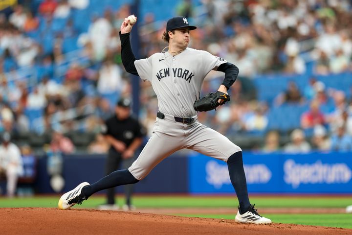 Yankees starting pitcher Cam Schlittler (31) throws a pitch against the Tampa Bay Rays in the first inning at Tropicana Field