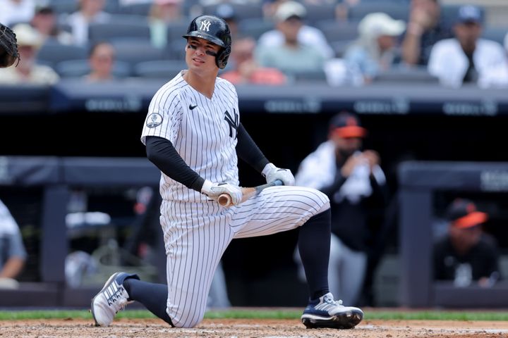 Yankees shortstop Anthony Volpe (11) reacts after striking out to end the fourth inning against the Detroit Tigers at Yankee
