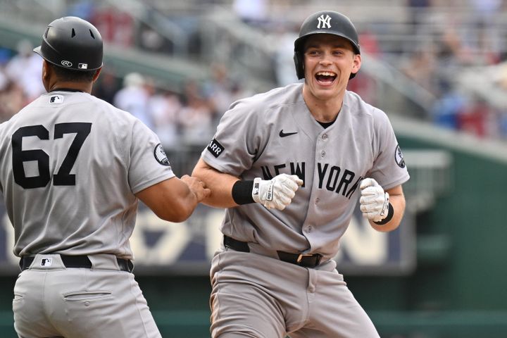 Yankees infielder Ben Rice (22) celebrates after hitting a two-run triple in the eighth inning against the Washington Nationa
