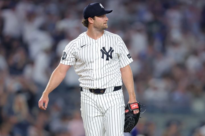 Yankees starting pitcher Gerrit Cole (45) reacts after giving up a two run home run to Los Angeles Dodgers third baseman Max