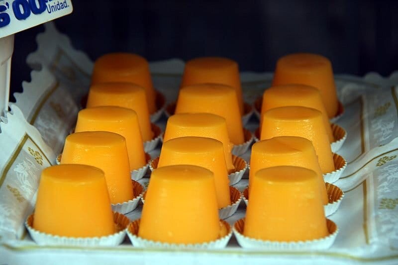 Here is a photo I nabbed from Wikipedia of some tocinillos de cielo. These are a lot yellower than the other photos I’ve found, but I’m trying not to step on any copyright toes, so this is the image you all get.