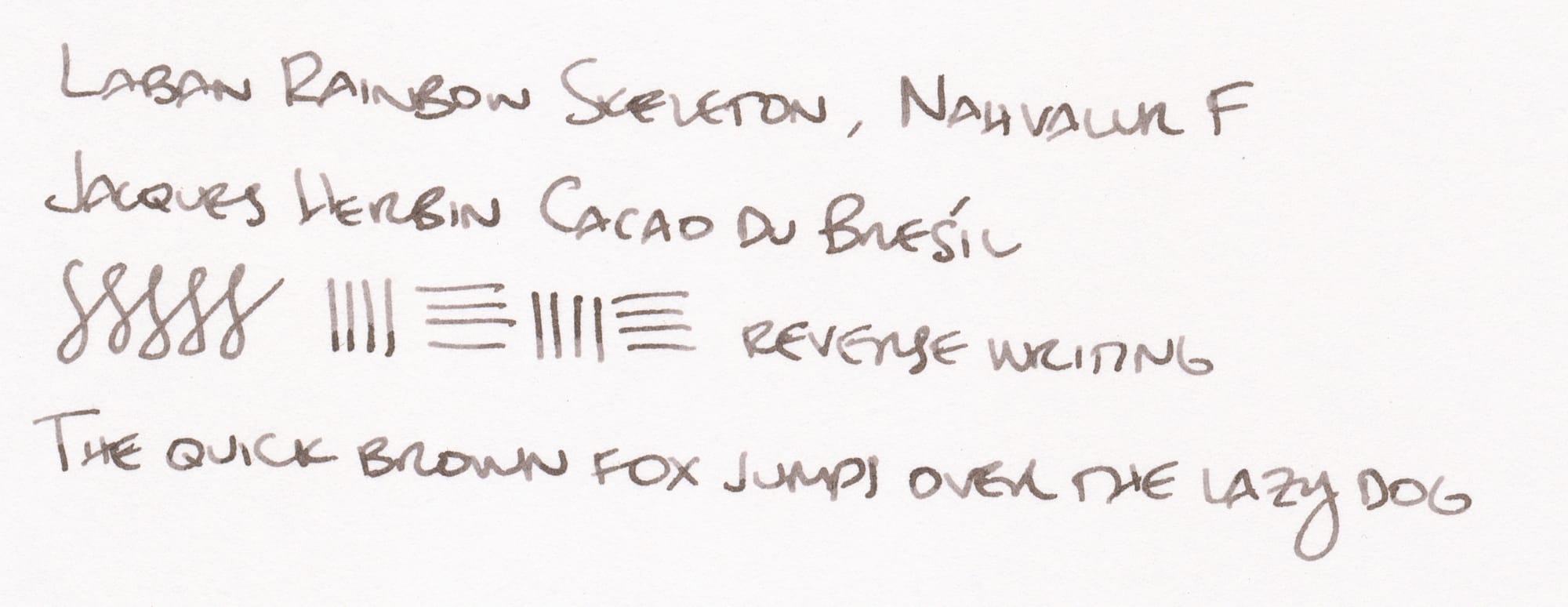 Writing sample written in another grayish-brown ink that says, "Laban Rainbow Skeleton, Nahvalur F; Jacques Herbin Cacao du Brésil; [figure-8s and horizontal and vertical lines], reverse writing; The quick brown fox jumps over the lazy dog"