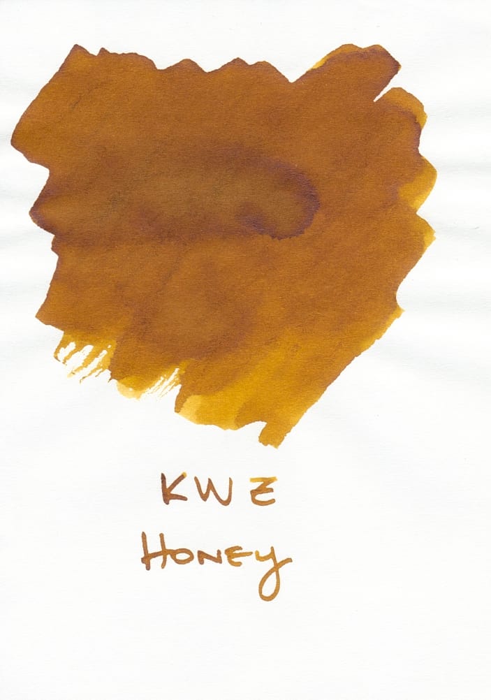 Fountain pen ink swatch of a golden, honey brown ink, labeled "KWZ Honey"