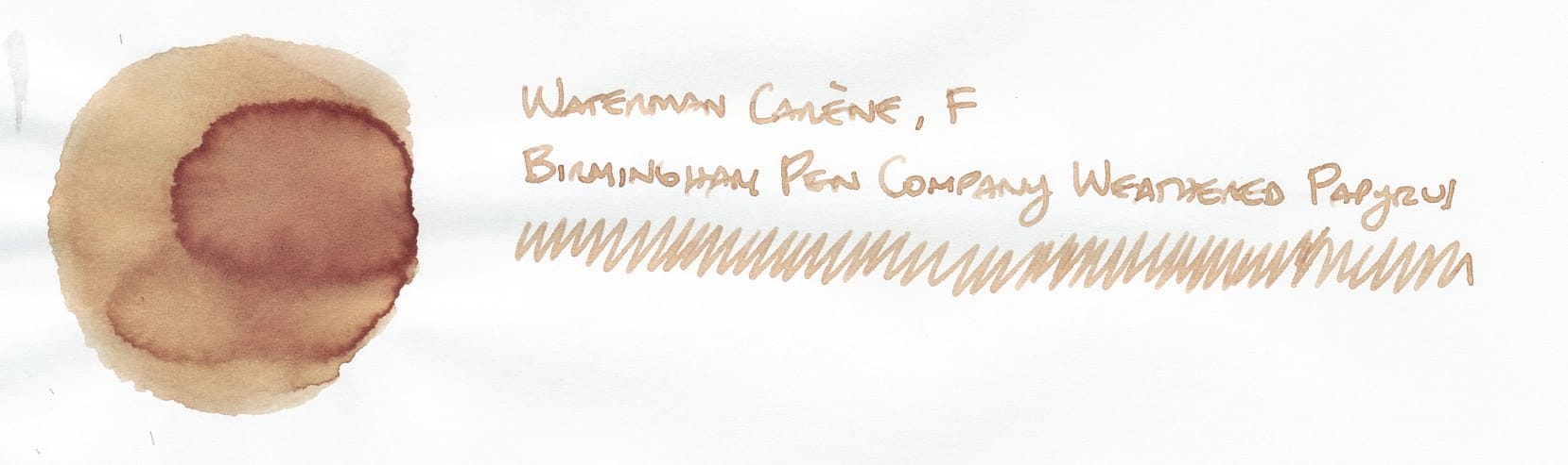 Circular fountain pen ink swatch on left, a tannish brown shade, labeled "Waterman Carène, F; Birmingham Pen Company Weathered Papyrus" on right