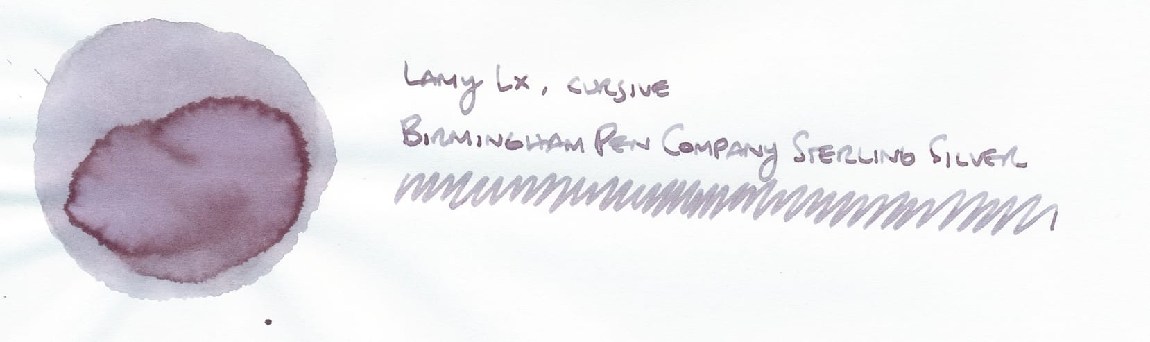 Circular fountain pen ink swatch on left, a cool, gray shade with purpley/mauve tones, labeled "Lamy Lx, cursive, Birmingham Pen Company Sterling Silver" on right