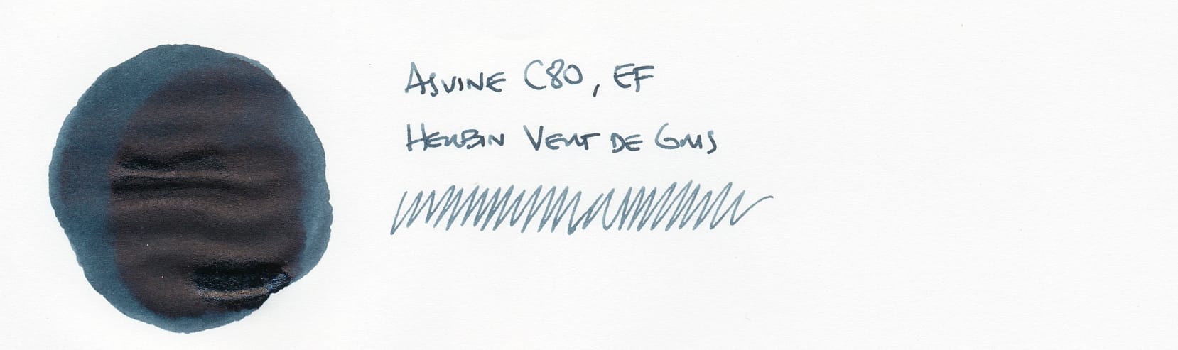 Circular fountain pen ink swatch on left, dark greenish-blue-gray, labeled "Asvine C80, EF; Herbin Vert de Gris" on right