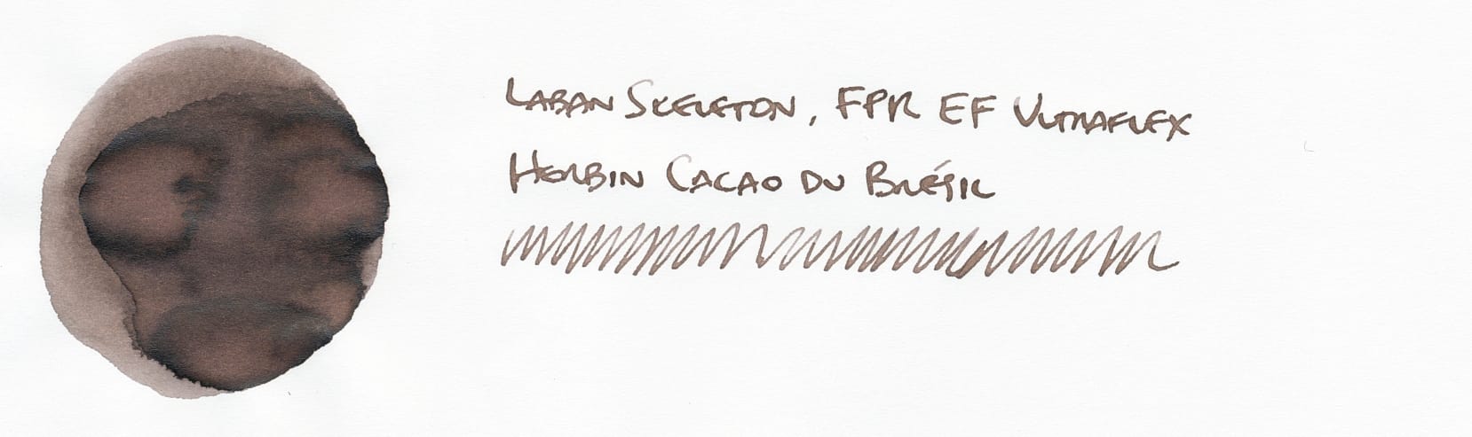 Circular fountain pen ink swatch on left, a medium-dark grayish brown, labeled "Laban Skeleton, FPR EF Ultraflex; Herbin Cacao du Brésil" on right