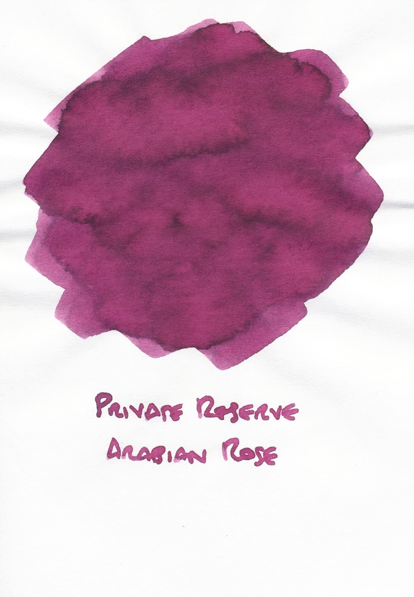 Swatch of a purple-rose ink labeled "Private Reserve Arabian Rose"