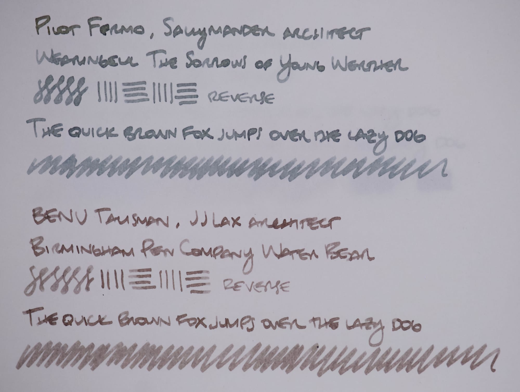 Writing samples using a warm gray ink on the top, and a warm brown ink on the bottom