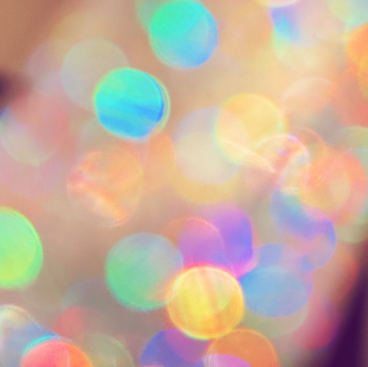 Multicolored bokeh balls in an abstract pattern in a square framing