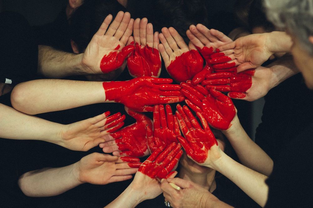 Many hands, making a heart