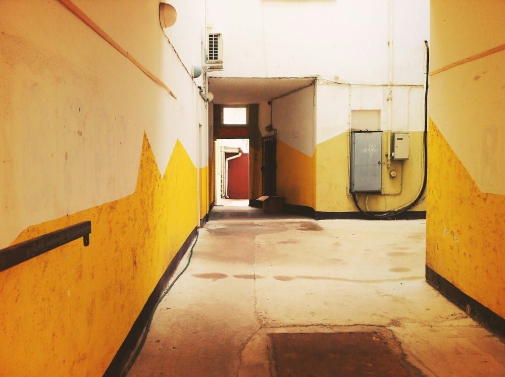 A picture of a corridor in the backroom of some institution...