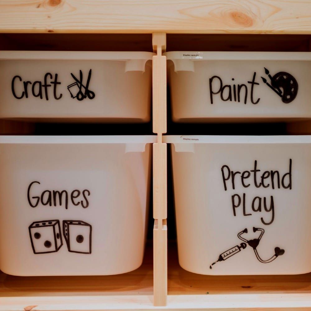 four boxes of activities, labelled craft, paint, games, pretend play
