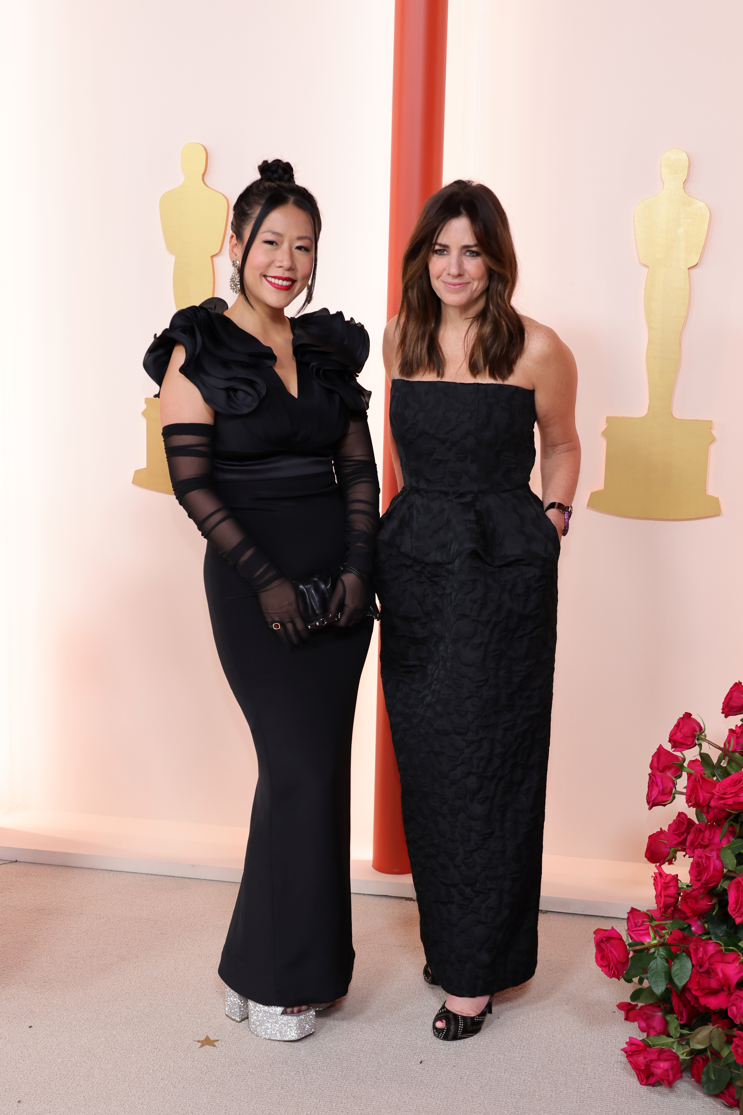 Domee Shi and Lindsey Collins attend the 95th Annual Academy Awards