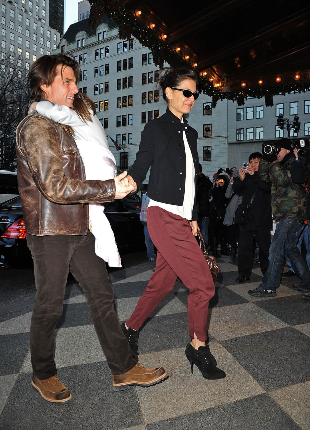 Tom Cruise, Suri Cruise and Katie Holmes visit the Plaza Hotel on December 20, 2010