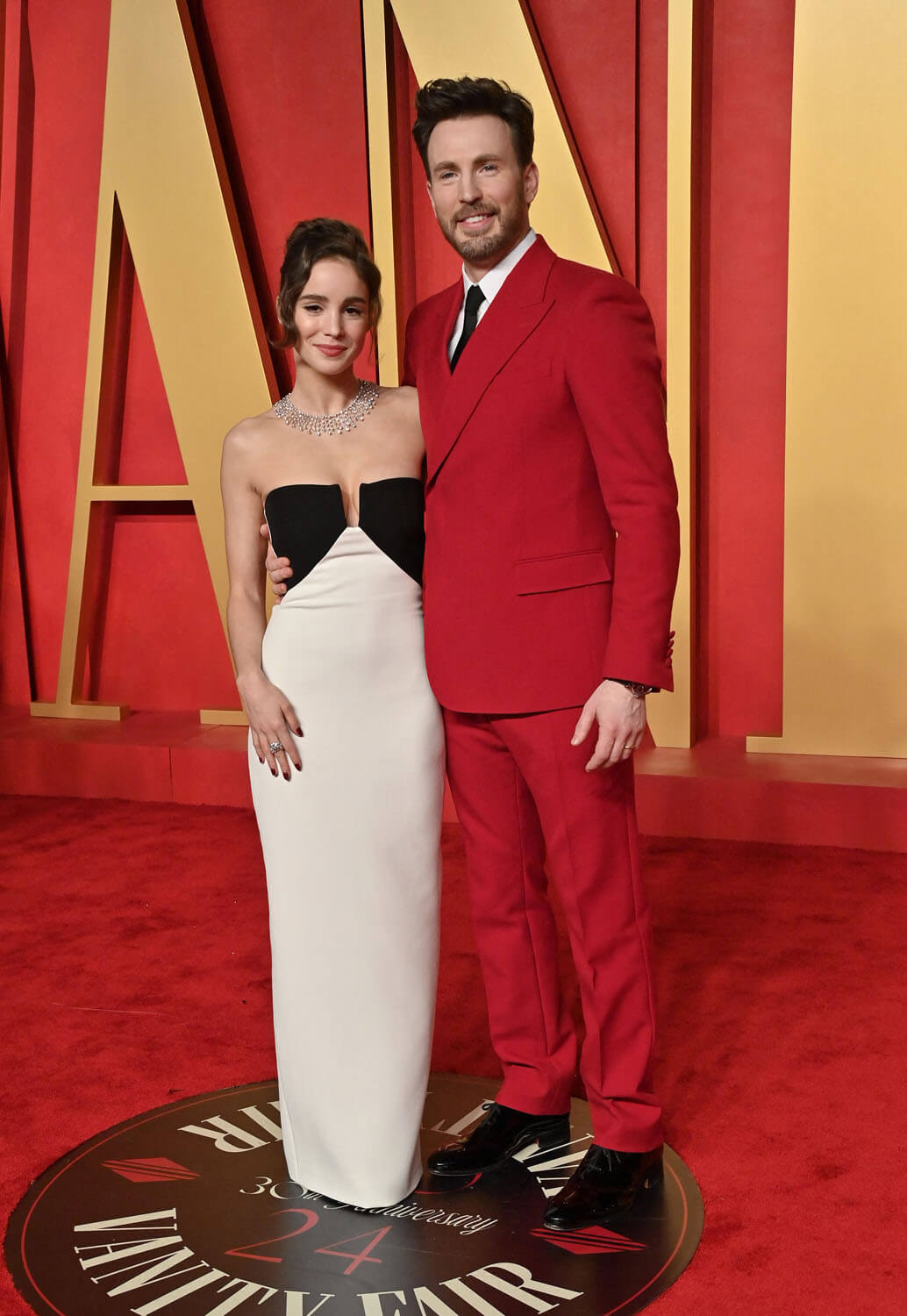 Alba Baptista and Chris Evans at the 2024 Vanity Fair Oscar Party