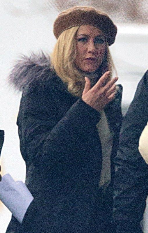 Very blonde Jennifer Aniston in a beret