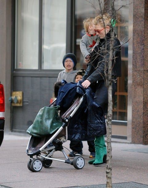 Stroller and green boots