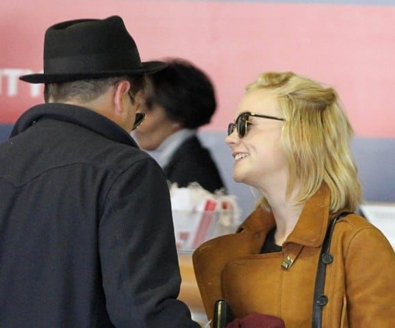 Carey travels with the band