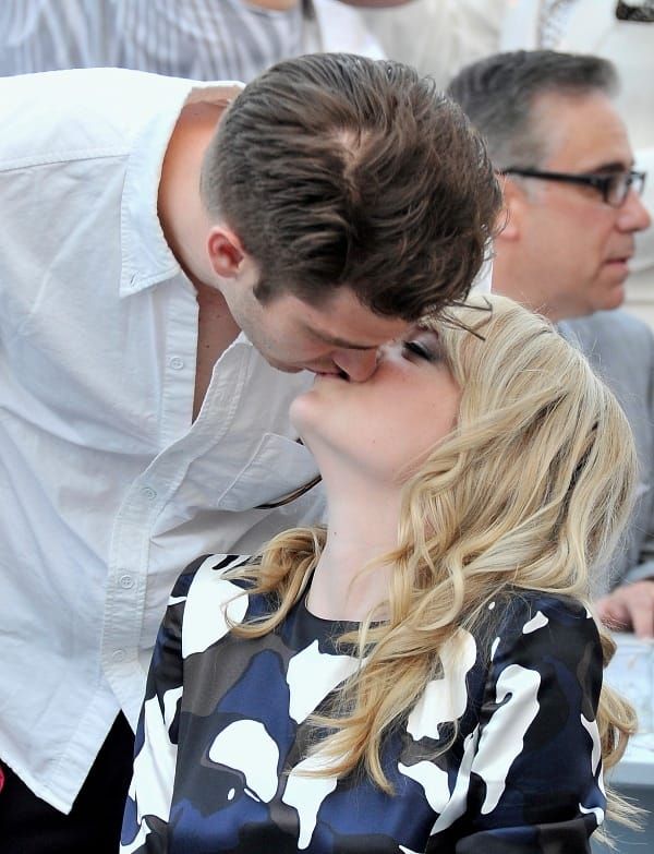 Andrew kisses Emma