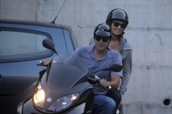 The back of Clooney’s bike is not empty