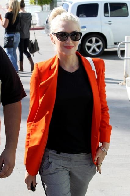 Carpets & Candids: Gwen’s optical illusion pants and orange blazer