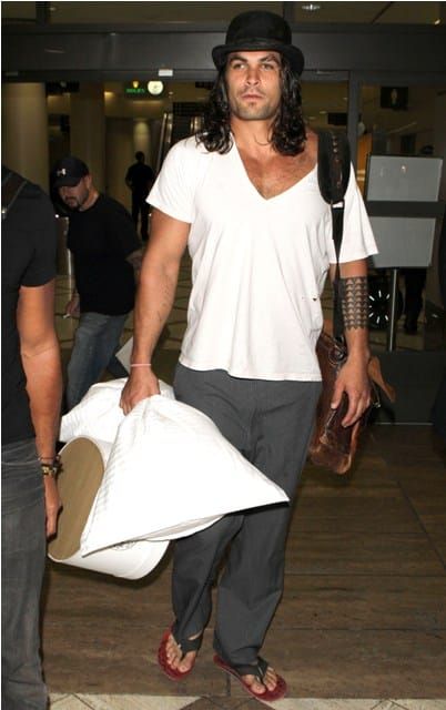A pillow and a hat box