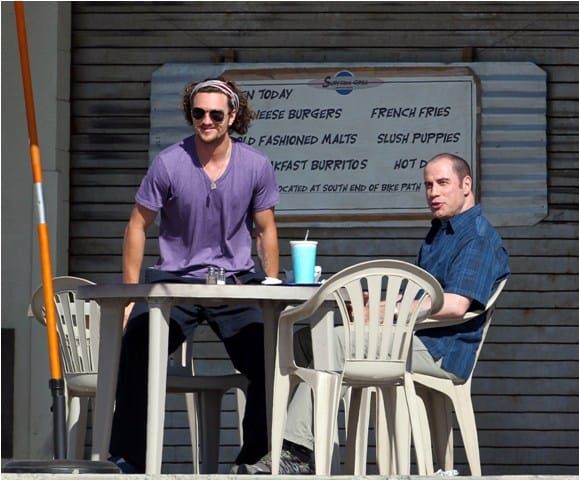 John Travolta is no longer spray-painting his head
