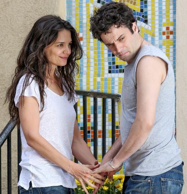 Katie holds hands