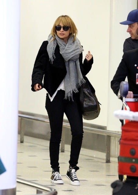 Nicole flies back and forth