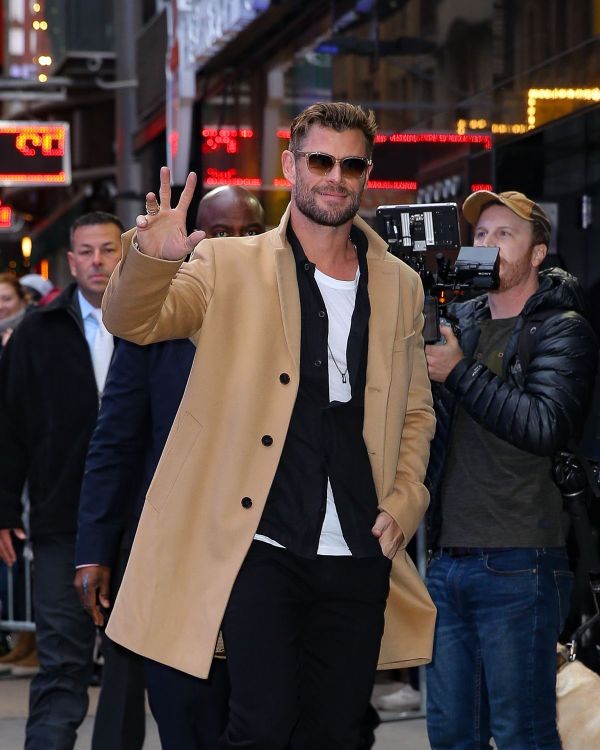 Chris Hemsworth in a camel coat