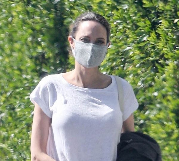 Angelina… while Brad’s selling champagne