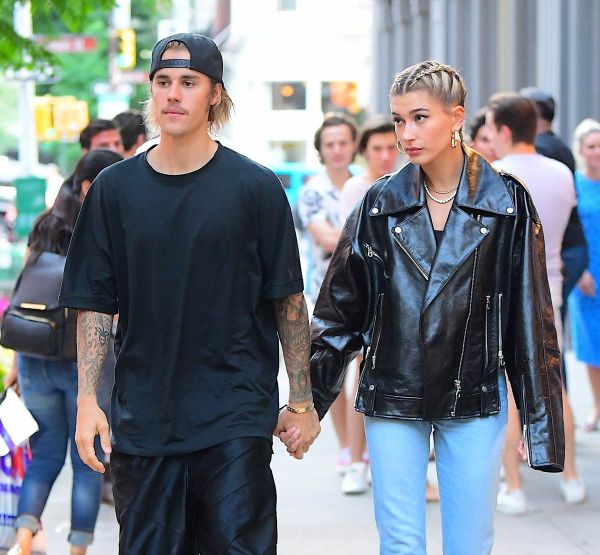 JB and Hailey holding hands